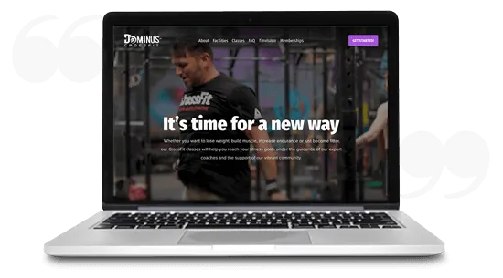 Dominus CrossFit website shown on a laptop screen