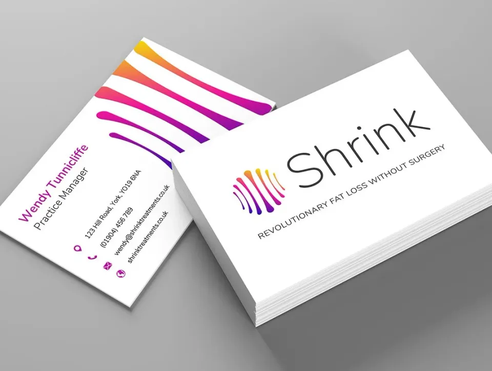 Shrink business cards showing the new logo