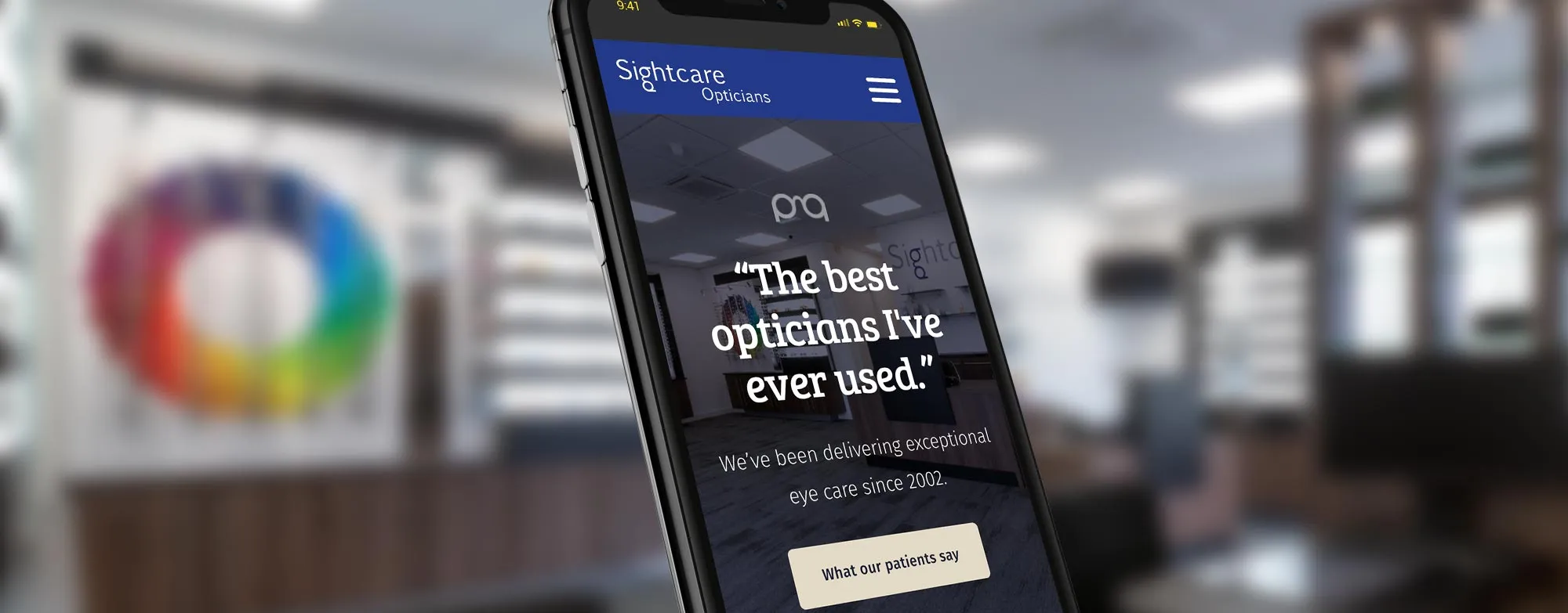 Sightcare Opticians website design shown on a mobile phone