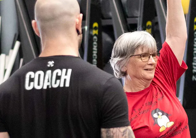 Dominus CrossFit gym photography of a member training with kettlebells